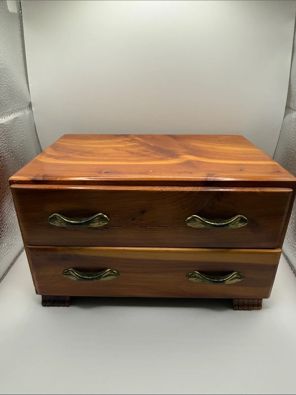 Vtg salesman sample cedar chest features two drawers w/distinctive brass handles